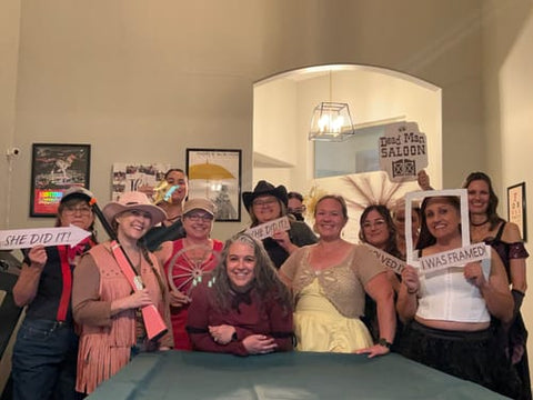 Group in Wild West costumes playing the cowboy murder mystery — verified Loox review photo