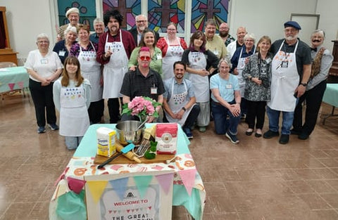 Large costumed group playing the Bake Off murder mystery — verified Loox review photo