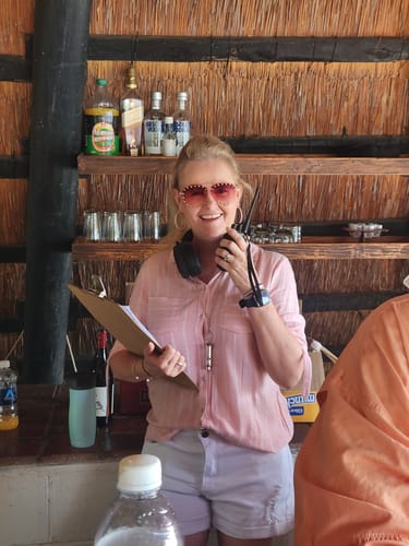 Player in 1980s character costume with clipboard and walkie-talkie — verified Loox review photo