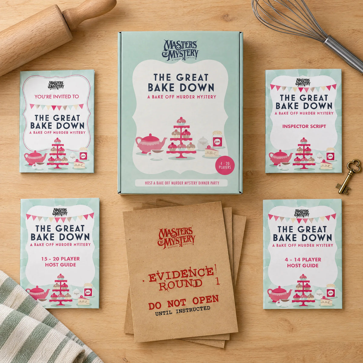 The Great Bake Down! by Masters of Mystery: game box and contents in a themed flat lay.