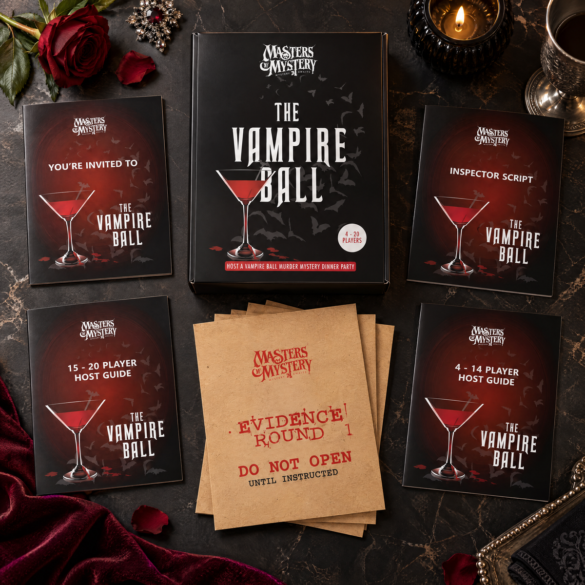 Masters of Mystery The Vampire Ball game box and printed contents arranged in a themed overhead flat lay.