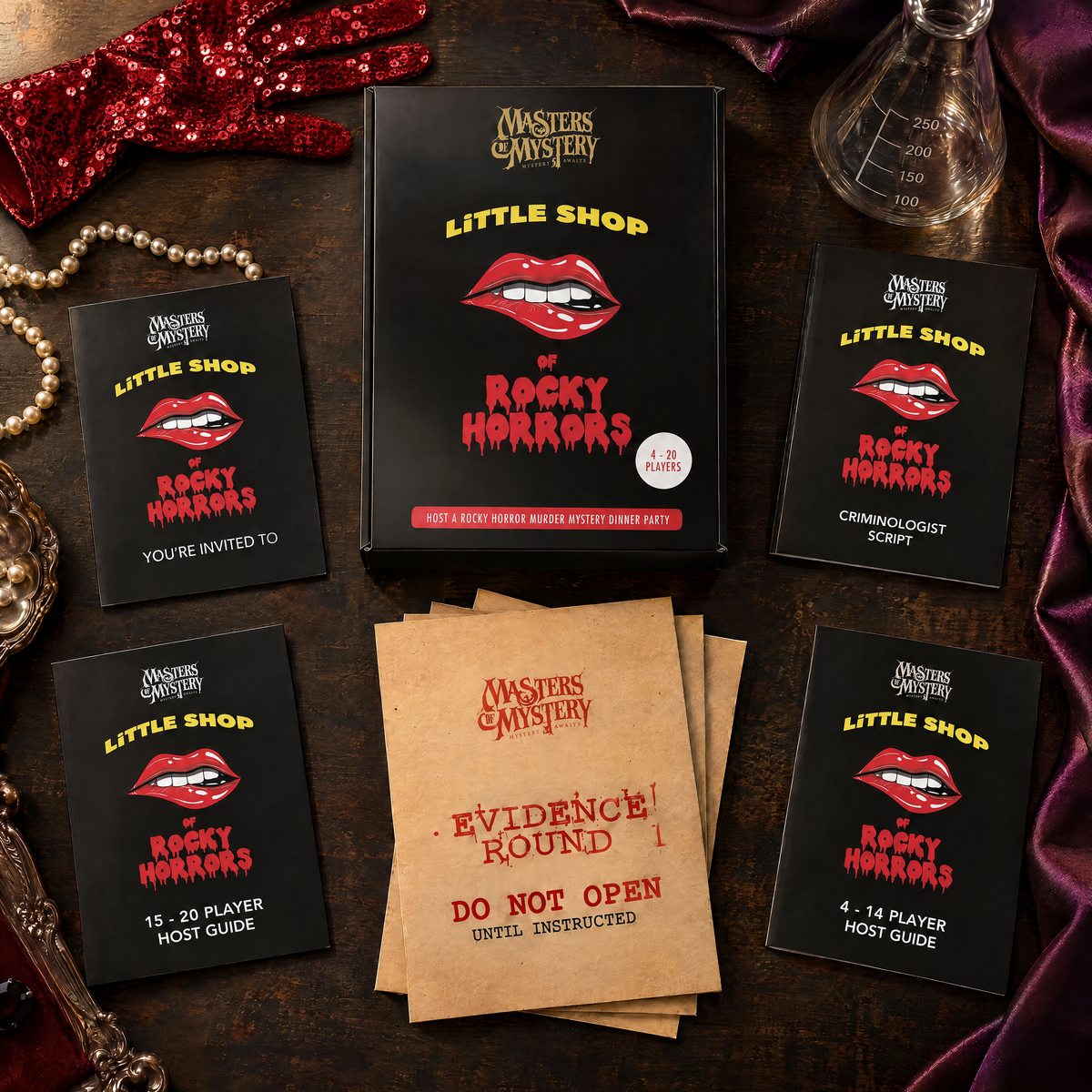 Masters of Mystery Little Shop of Rocky Horrors game box and printed contents arranged in a themed overhead flat lay.