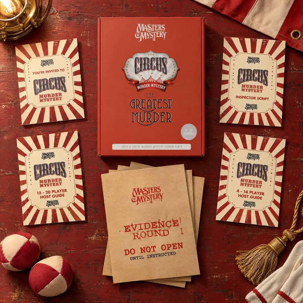 Masters of Mystery Murder at the Big Top game box and printed contents arranged in a themed overhead flat lay.
