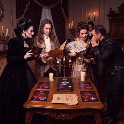 Vampire Ball Murder Mystery Game being played by guests at a themed party – 1x1 lifestyle image